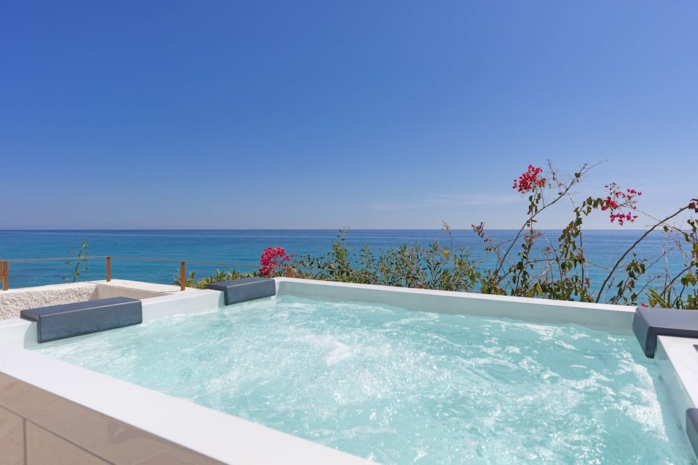 Villajoyosa Villa | Charming Costa Blanca Villa | Villa Robero | 3 Bedrooms | Beachfront | Spectacular Sea Views | Spacious Furnished Sun Terrace with Private Hot Tub | BBQ facilities | Outdoor Dining Area | Villajoyosa