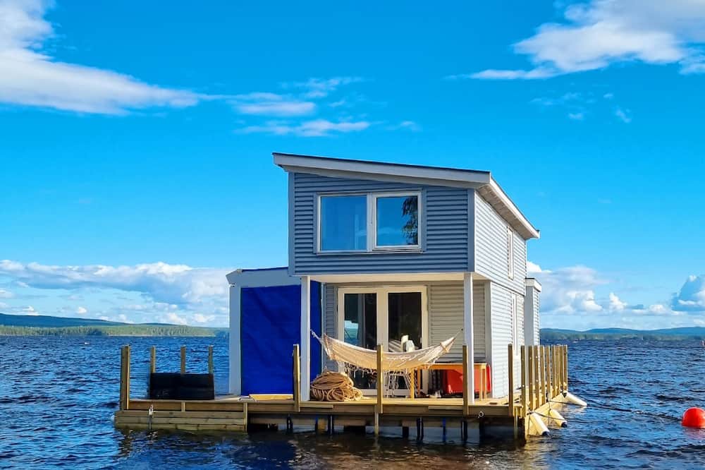 Falun Boat Rental | Relax on our Houseboat- Take a swim in the summer or go skating in the winter