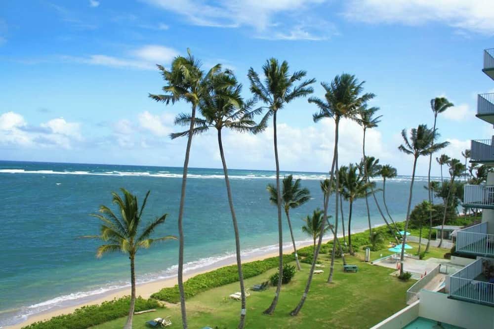 Punaluu Apartment | Palm Beachfront | Amazing view, Pool, beach gear