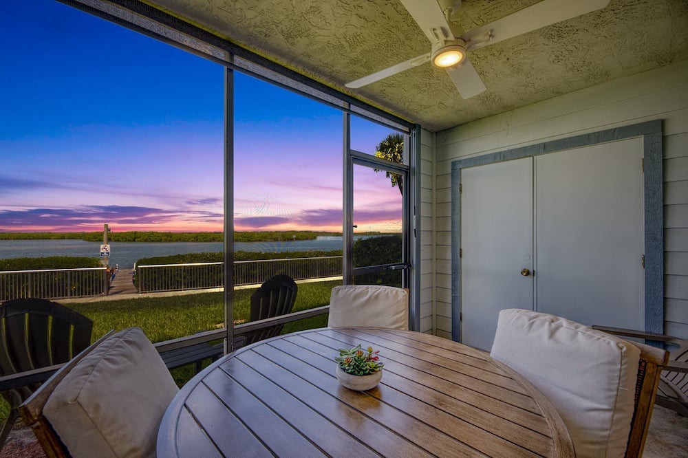 Bethune Beach Condo | Riverfront / Boat Dock / Pool / Walk to Beach / Cedar Island Club