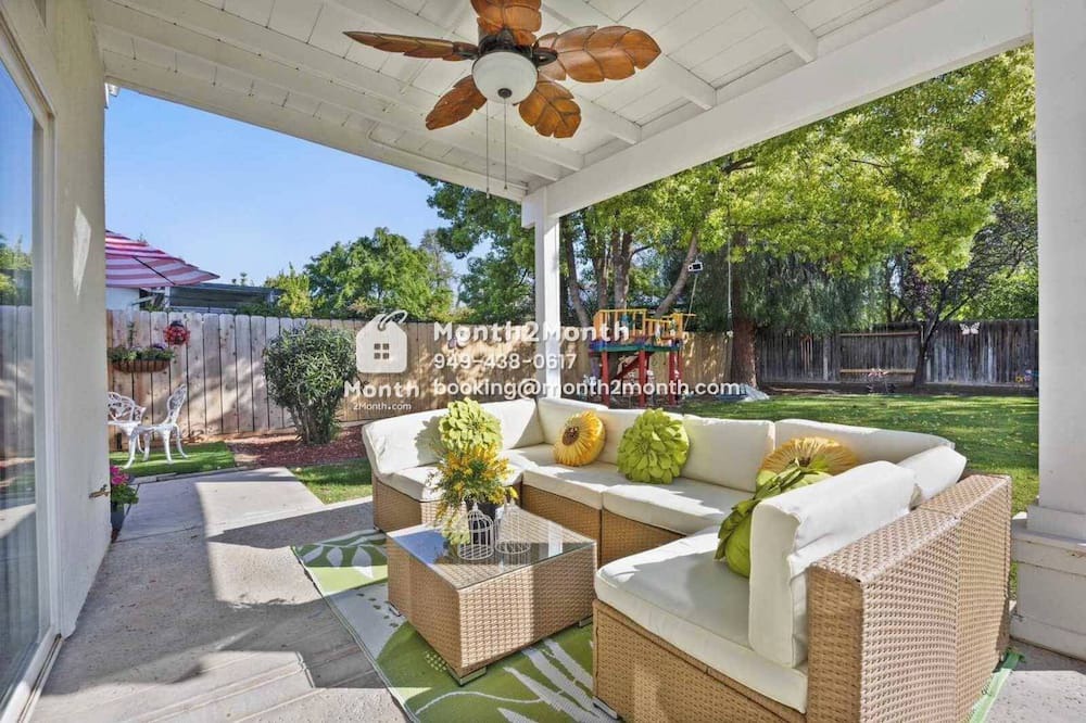 Greenacres House | Back Yard with Lawn & Dedicate Office & Single-Story
