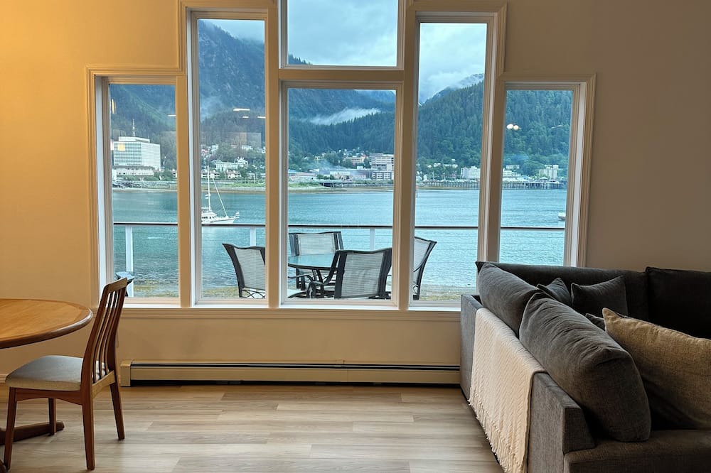Juneau House | Spacious beachfront retreat with views of Gastineau Channel and downtown Juneau.