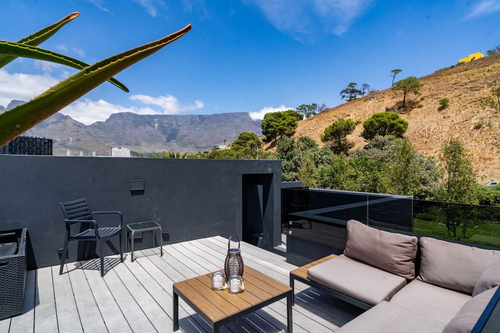 Bo'Kaap Apartment | Charming Apartment with Sundeck + Fire Wood Hot tub in de Waterkant.