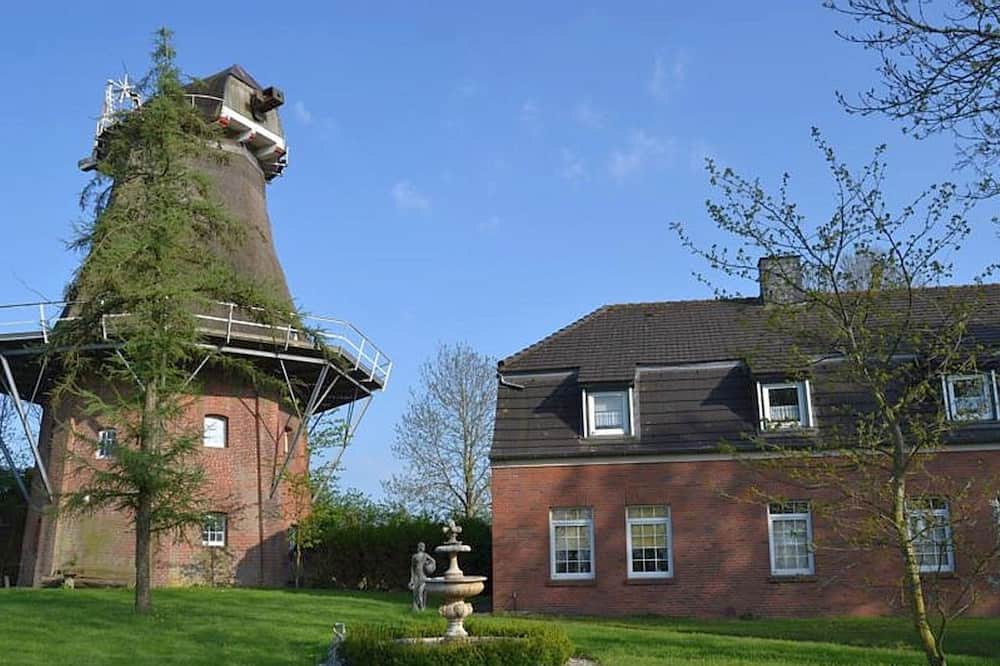 Uttum Apartment | Gemütliche Erdgeschosswohnung im Müllerhaus der Uttumer Mühle - Uttumer Mühle