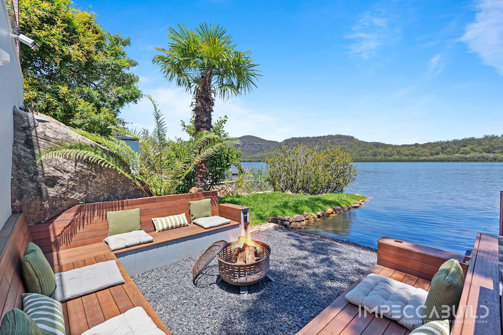 Central Coast Council House | Discover Your Riverside Retreat: Modern Comforts, Private Jetty, & Scenic Views!