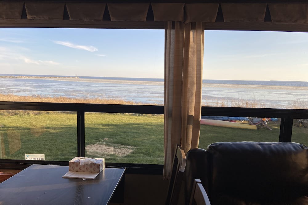 Neguac House | Camping in style with serene waterfront views!