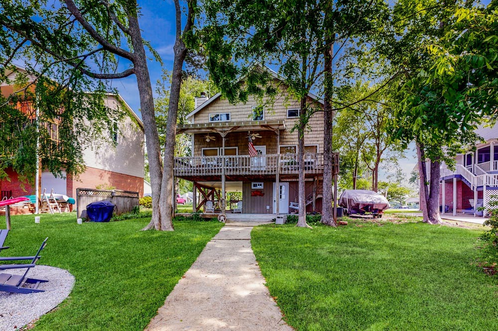 Newberry Shores House | Unique waterfront home with direct water access, dock, firepit, porch, W/D, AC
