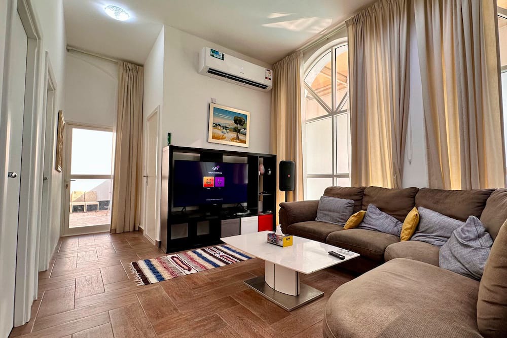 Doha Apartment | Heart of Doha Elegant Home with Shared Swimming Pool