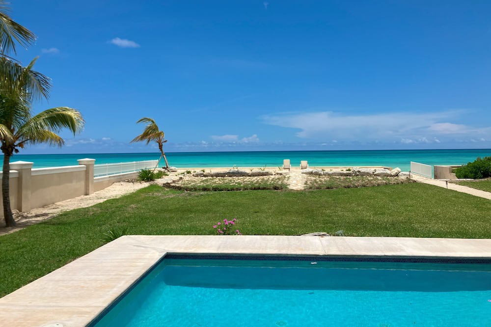 High Rock Villa | Beach front pool home with striking views and space for family and friends.