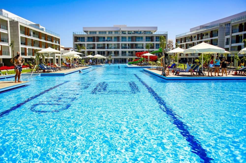 Trikomo Apartment | Delightful Studio Flat Close to the Beach with Shared Pool and Balcony in Iskele, Cyprus