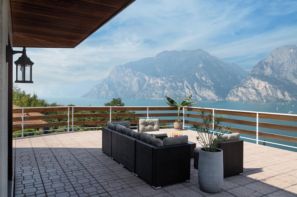 Torbole sul Garda Apartment | Exclusive residence in Torbole with breathtaking views, large terrace.