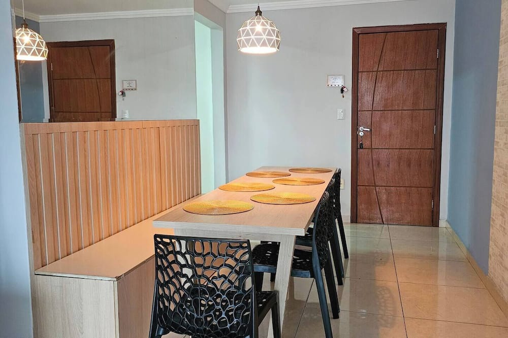 Contagem Apartment | Apartment 1 km from the beach with air conditioning and garage