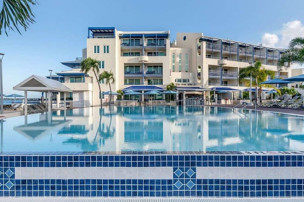 Pelican Key Resort | Flamingo Beach by Hilton: Oceanfront Resort, Pools & Spacious Studios To Relax!