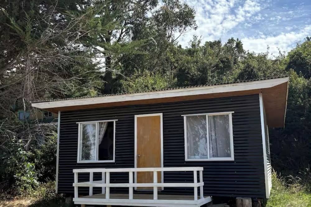 Ancud Cabin | “Descanso en el sur: Cabañita Chilota en Chiloé”