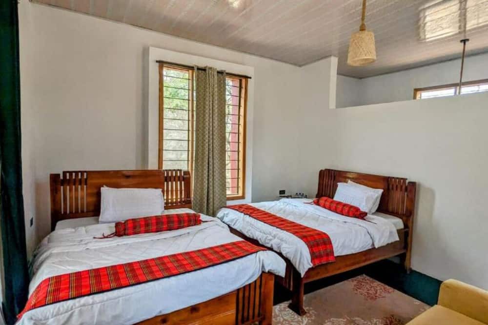Mikumi House | Double G safaris and Camp Mikumi - Luxury Triple Room 2