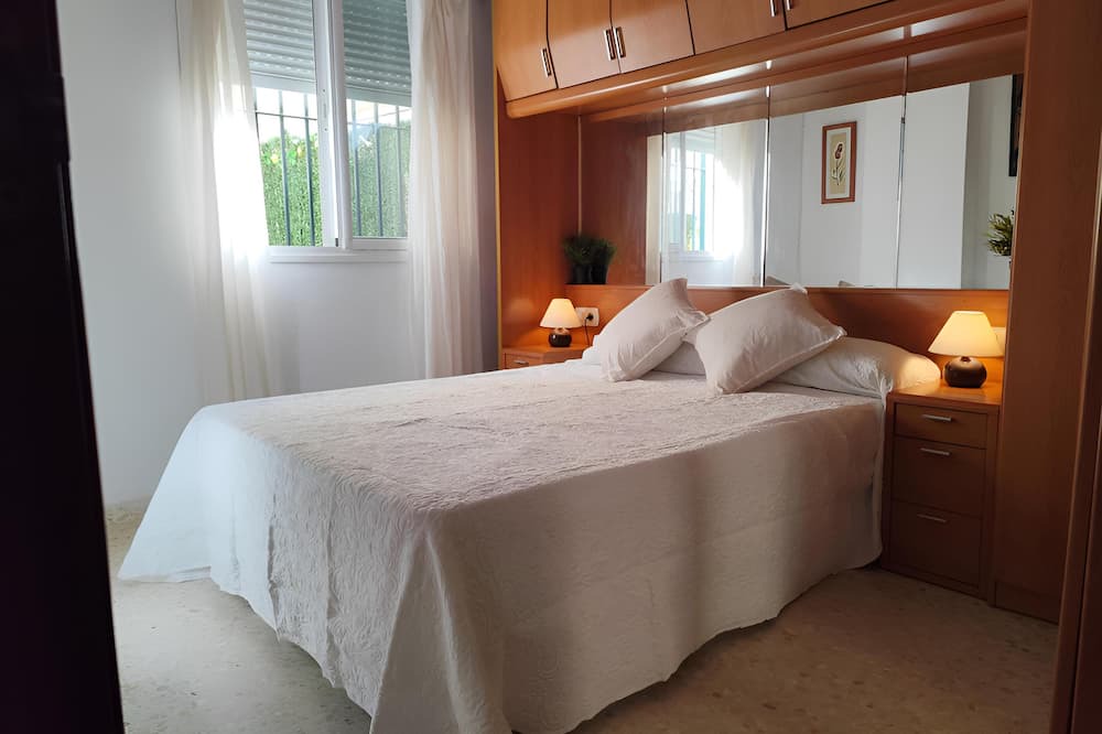 El Morche Apartment | Cupid Beach El Morche. Patio, Coast, Sea and Beach.