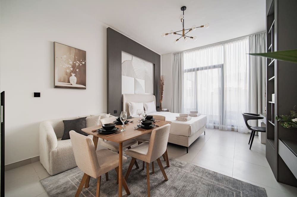 Dubai Apartment | Quiet Top-Floor Studio Near Metro + Baby Gear