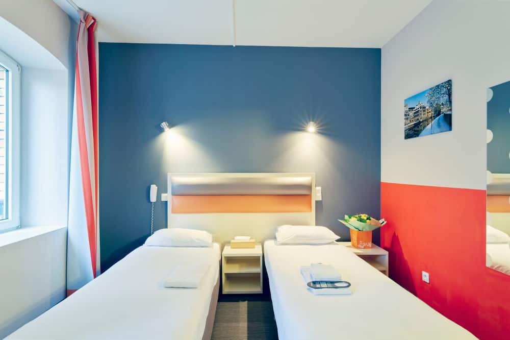 Contades Hotel | A short drive to Rohrschollen Nature Reserve! Close to Place du Marché Gayot!