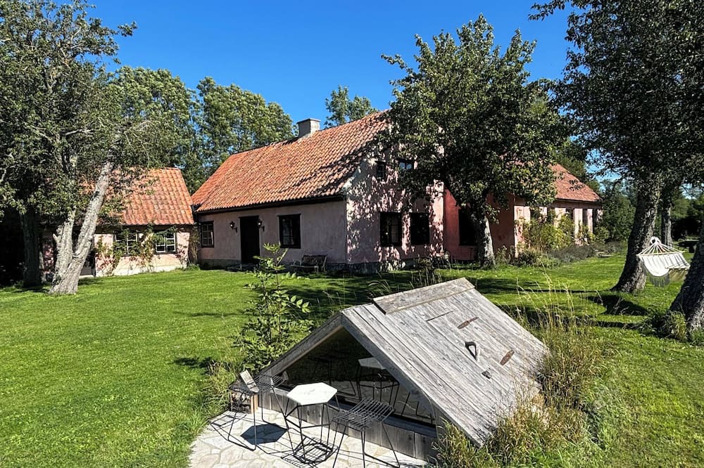 Havdhem Cottage | The Pink House on Gotland.nA private oasis with a French Mediterranean feel.