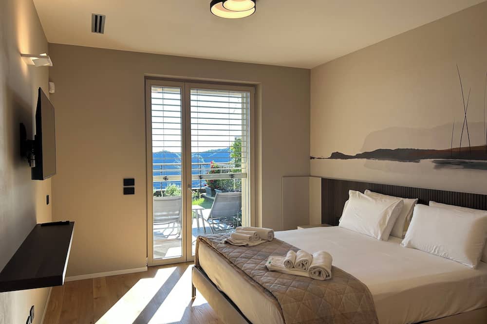 Civiglio Apartment | New stylish apartment with panoramic terrace and patio overlooking Lake Como.