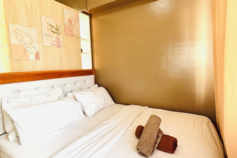 Iloilo Condo | Convenient City Hub with Relaxing Interior