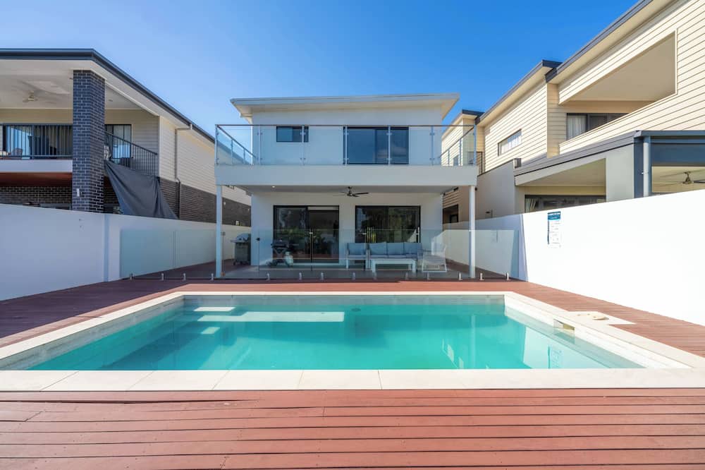 Helensvale House | Waterfront Wonder - Pool, Views & Luxury Stay