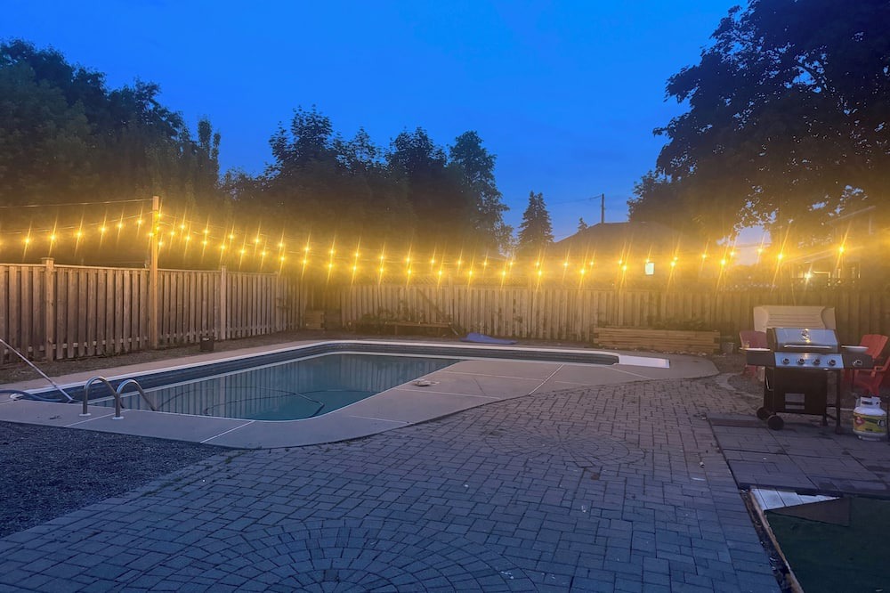 Brampton West House | Poolside Retreat with Private Patio