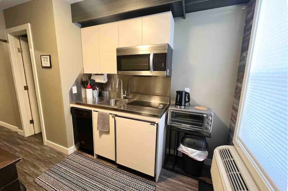 South Lethbridge Apartment | Central Farmhouse-Style Micro Apartment