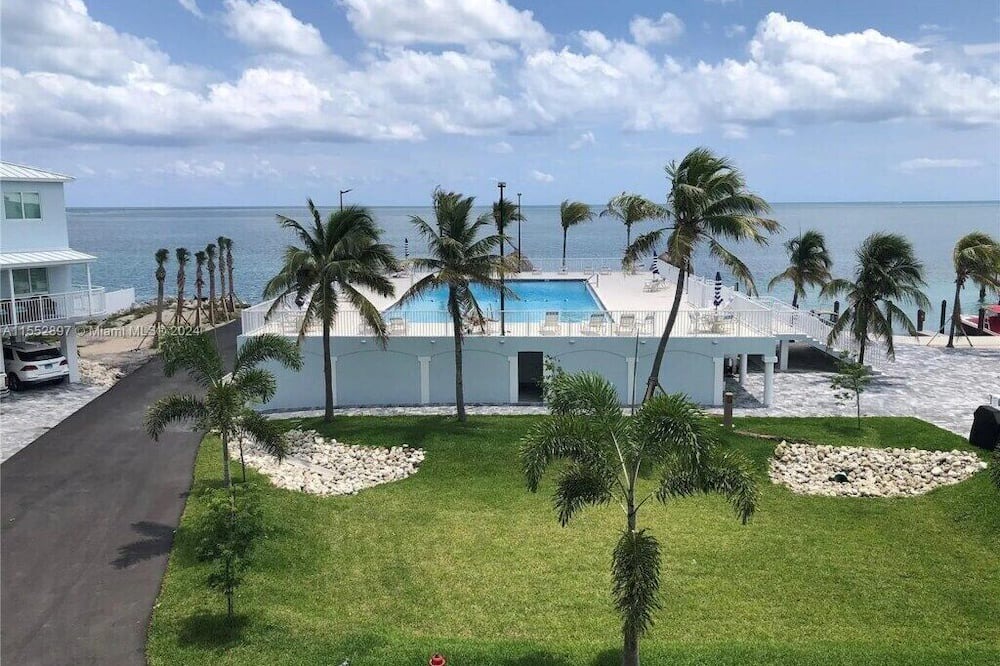 Marathon Apartment | Modern, Oceanfront Views Apartment in Marathon with a pool and a marina