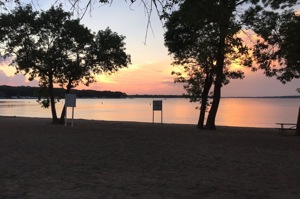 West Okoboji House | Hoist available for boats up to 25 ft. Charming 2BR house in lovely W. Okoboji