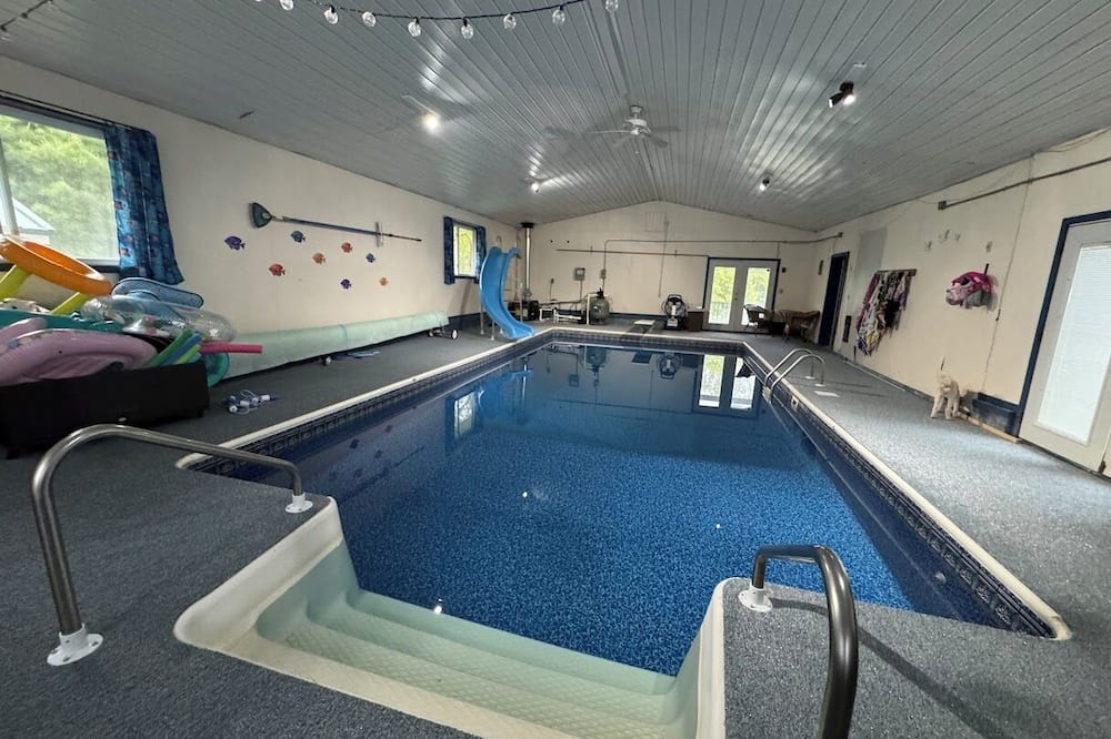 Homer House | Indoor pool, movie room, pool table, and more. Your Stay-cation Destination