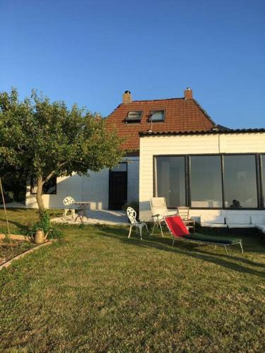 Sint Jacobiparochie Villa | Uniek dijkhuis + luxe interieur