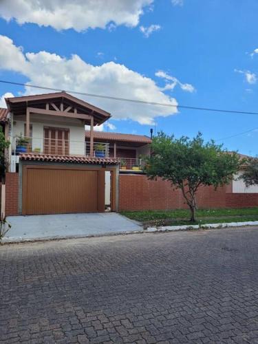 Harmonia Apartment | Studio com sacada, área de lazer e garagem.
