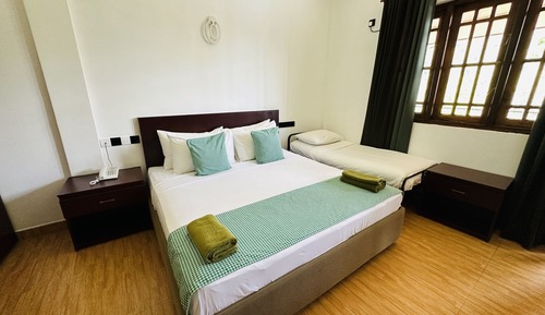 Deluxe Triple Room