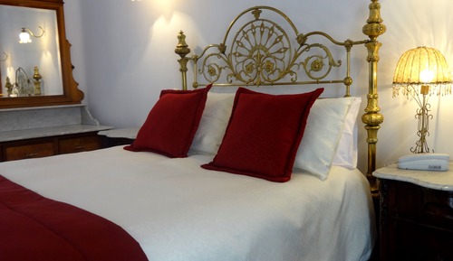 Deluxe Quadruple Room, 1 Bedroom, Private Bathroom, Courtyard View