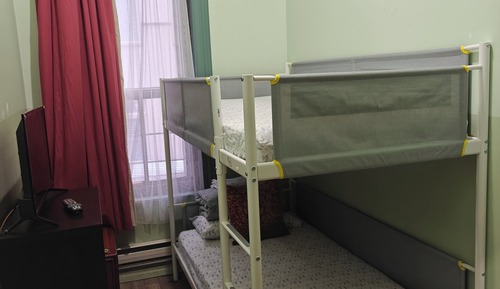 Twin bed with Shared Bathroom