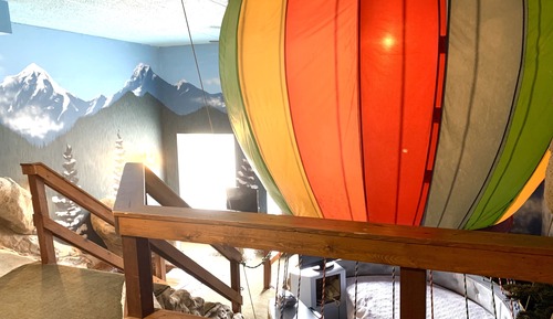 Up Up and Away, 1 Queen Bed ( Half Moon Shaped) (Main Floor)