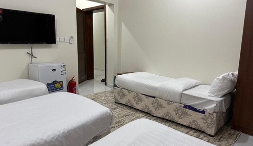 Deluxe Quadruple Room, City View