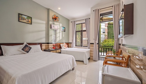 Deluxe Triple Room, Balcony, Garden View