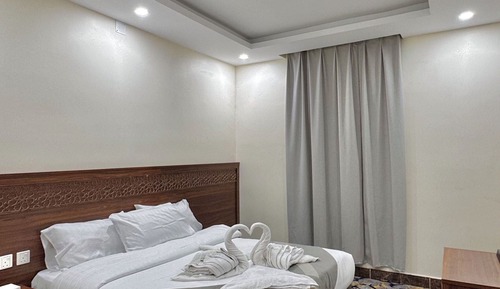Quadruple Room, City View