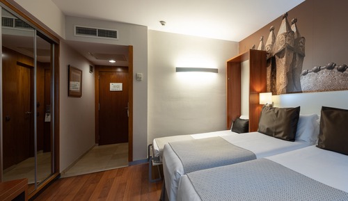 Triple Room (2 Adults + 1 Child)