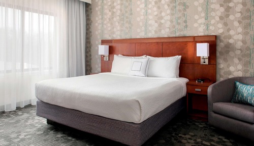 Deluxe Room, 1 King Bed with Sofa bed, Balcony, Courtyard View (Balcony Courtyard View)
