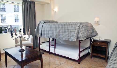 Quadruple Room (2 Adults + 2 Children)