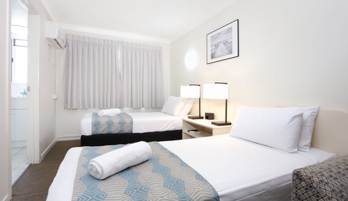 Motel Room (2 Single Beds + Double Sofa Bed)