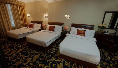 Deluxe Triple Room
