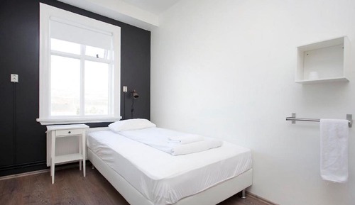 Basic Single Room, 1 Large Twin Bed, Shared Bathroom