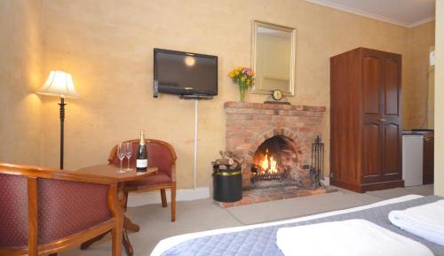 Heritage King Spa Fireplace Room