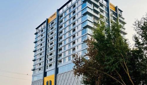 One-Bedroom Apartment with Balcony and City View
