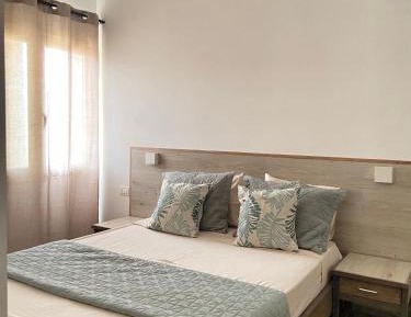 One-Bedroom Apartment with Balcony and City View