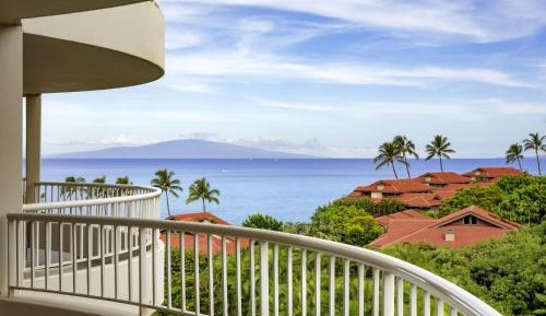King Suite with Sofa Bed and Partial Ocean View